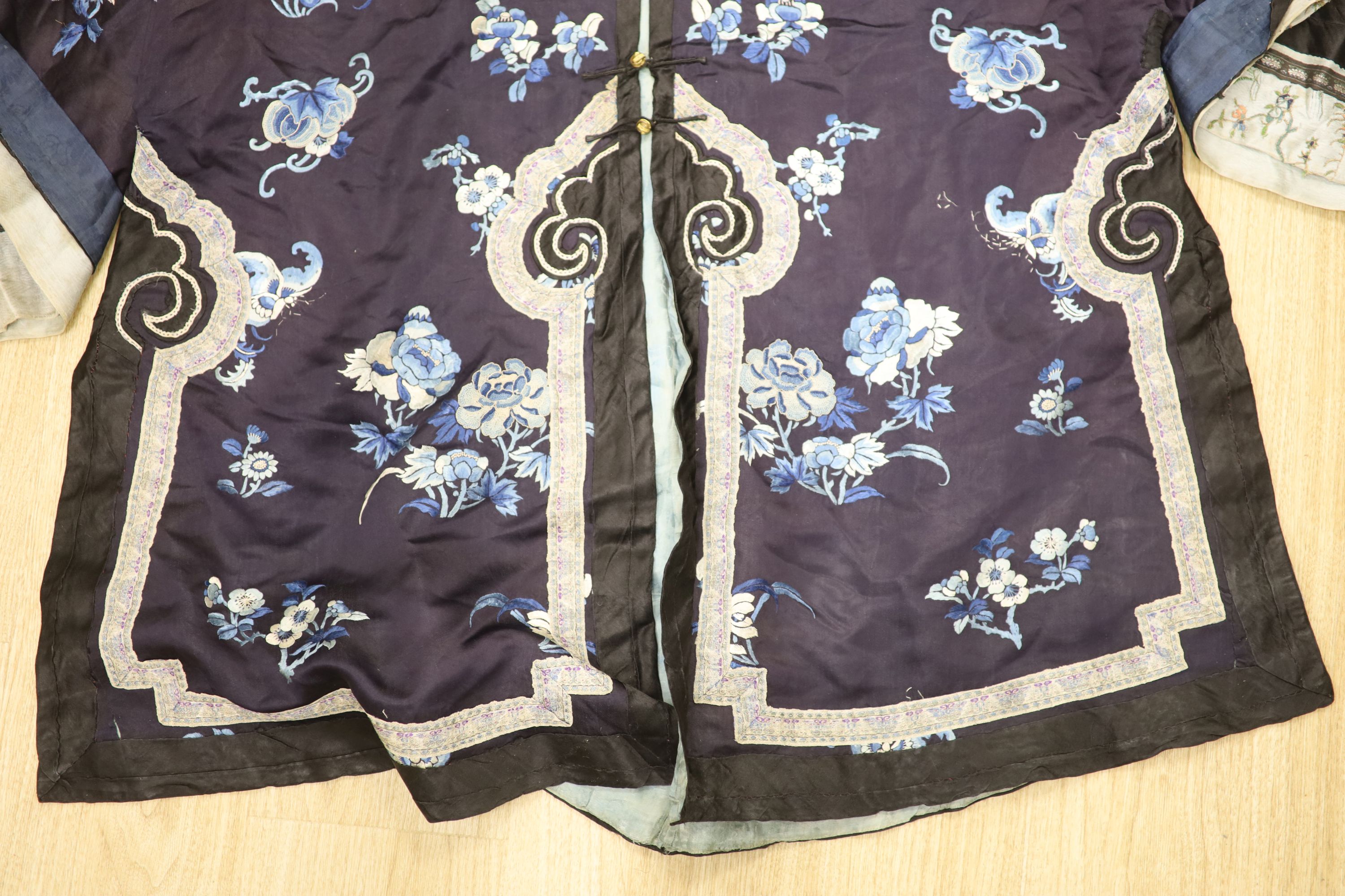 Two Chinese early 20th century embroidered silk jackets,